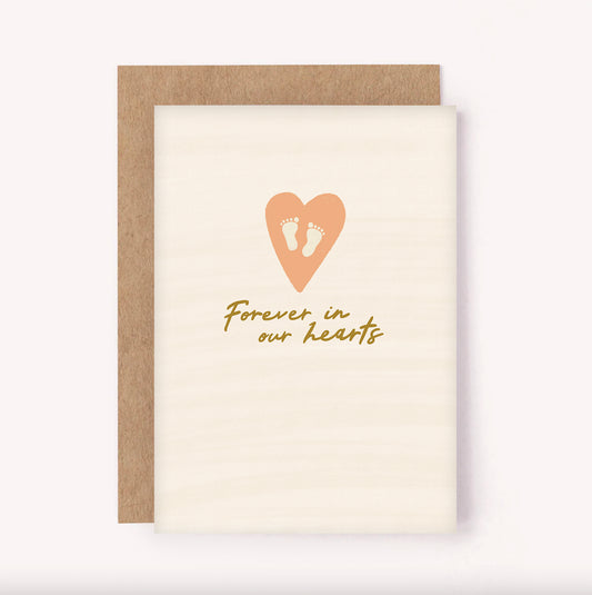 Illustrated "Forever In Our Hearts" baby loss sympathy card, in a soft palette of beige and pink with gold handwriting