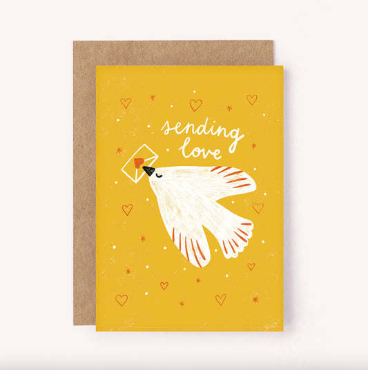 Illustrated "Sending Love" bright yellow greeting card, with a white beautiful bird carrying an envelope. This card will let someone know they're in your thoughts and is sure to brighten anyone's day